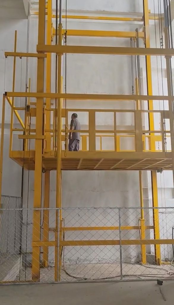 technician inspect hydraulic cargo lift maintenance